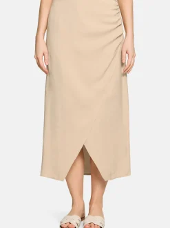Cartoon Damen Wickelrock in beige gold